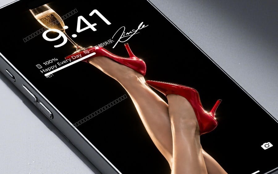 HD phone wallpaper featuring red high heels and champagne glass glam aesthetic on a black background