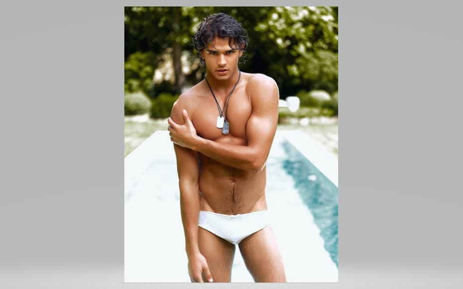 Poolside Allure: Athletic Male Portrait with Dog Tags