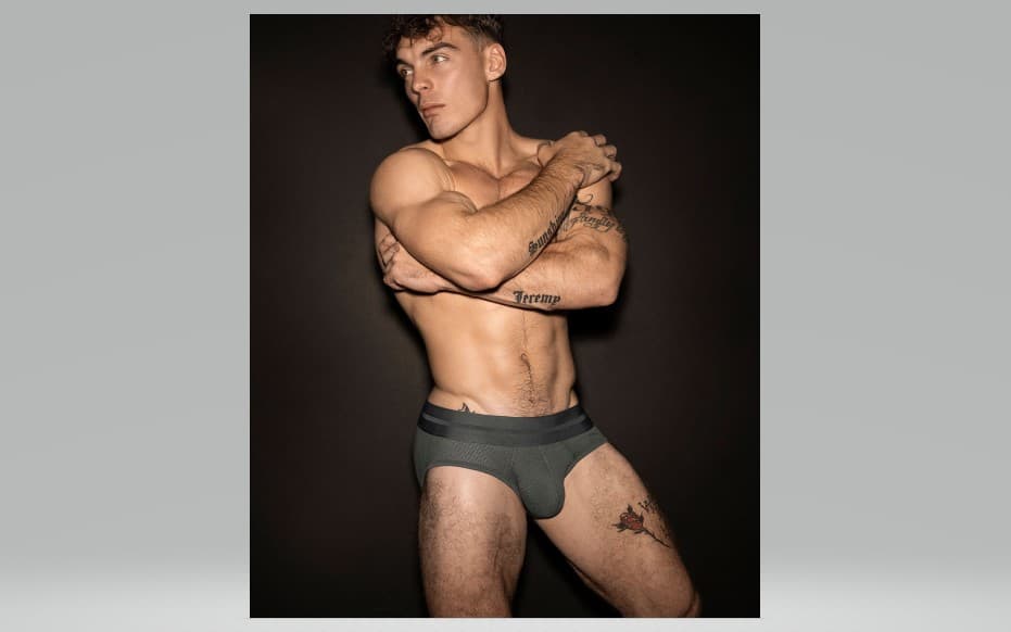 Midnight Contrast: Athletic Male Portrait against Matte Black