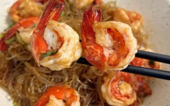 Close-up food photography featuring plated shrimp with chopsticks, mixed food lifestyle fashion photo collection product