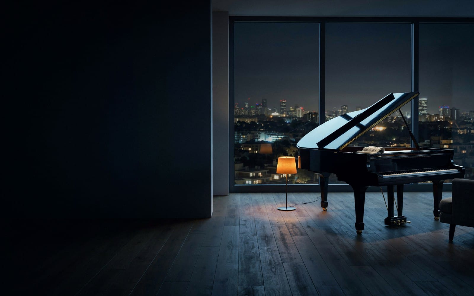 Black grand piano by a window overlooking a night city skyline in a modern living room setting