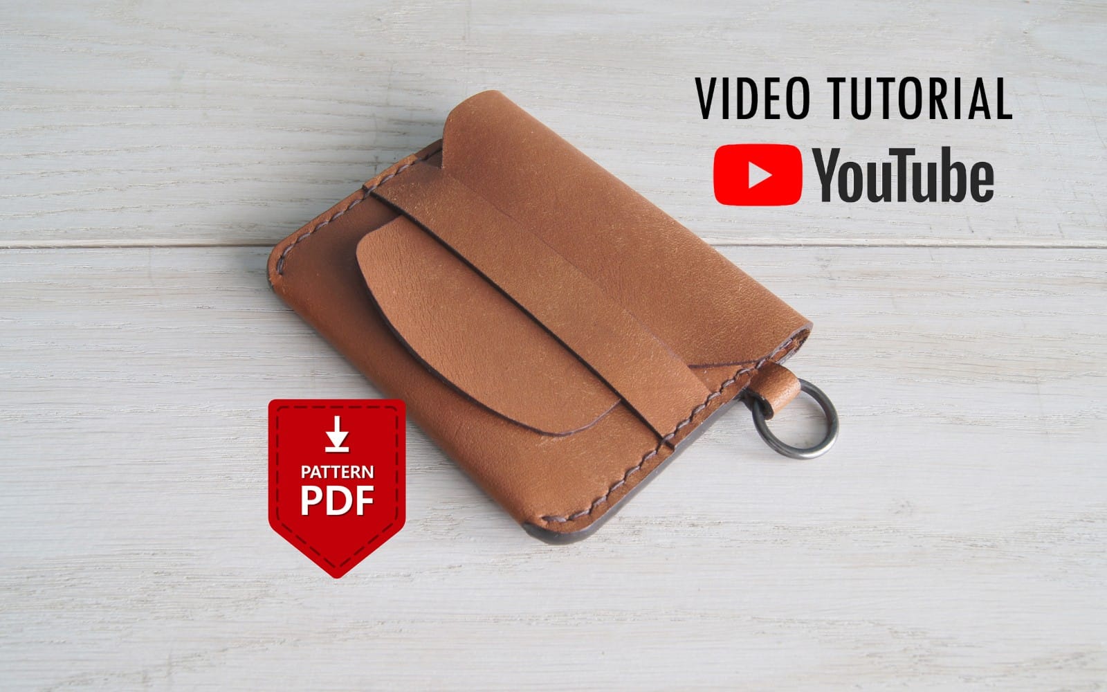 Brown leather flap card wallet shown with video tutorial and PDF pattern download icon overlay