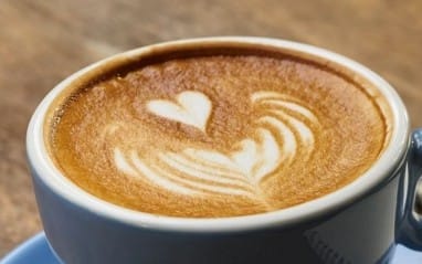Latte art coffee in a cup, digital template for a buy me a coffee donation page