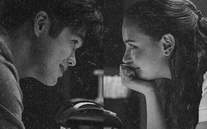 Black-and-white photo of two people having a digital key conversation in a software access product ad