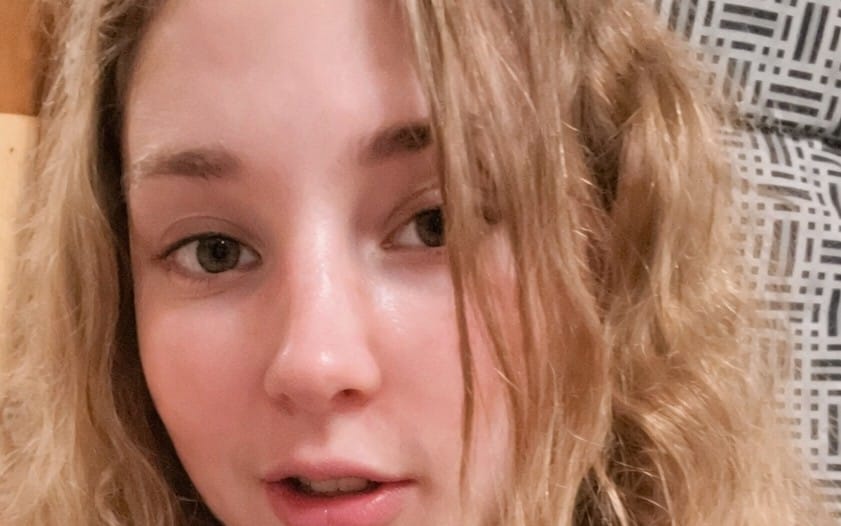 Close-up portrait of a blonde woman with VIP content locked overlay, adult digital content access offer