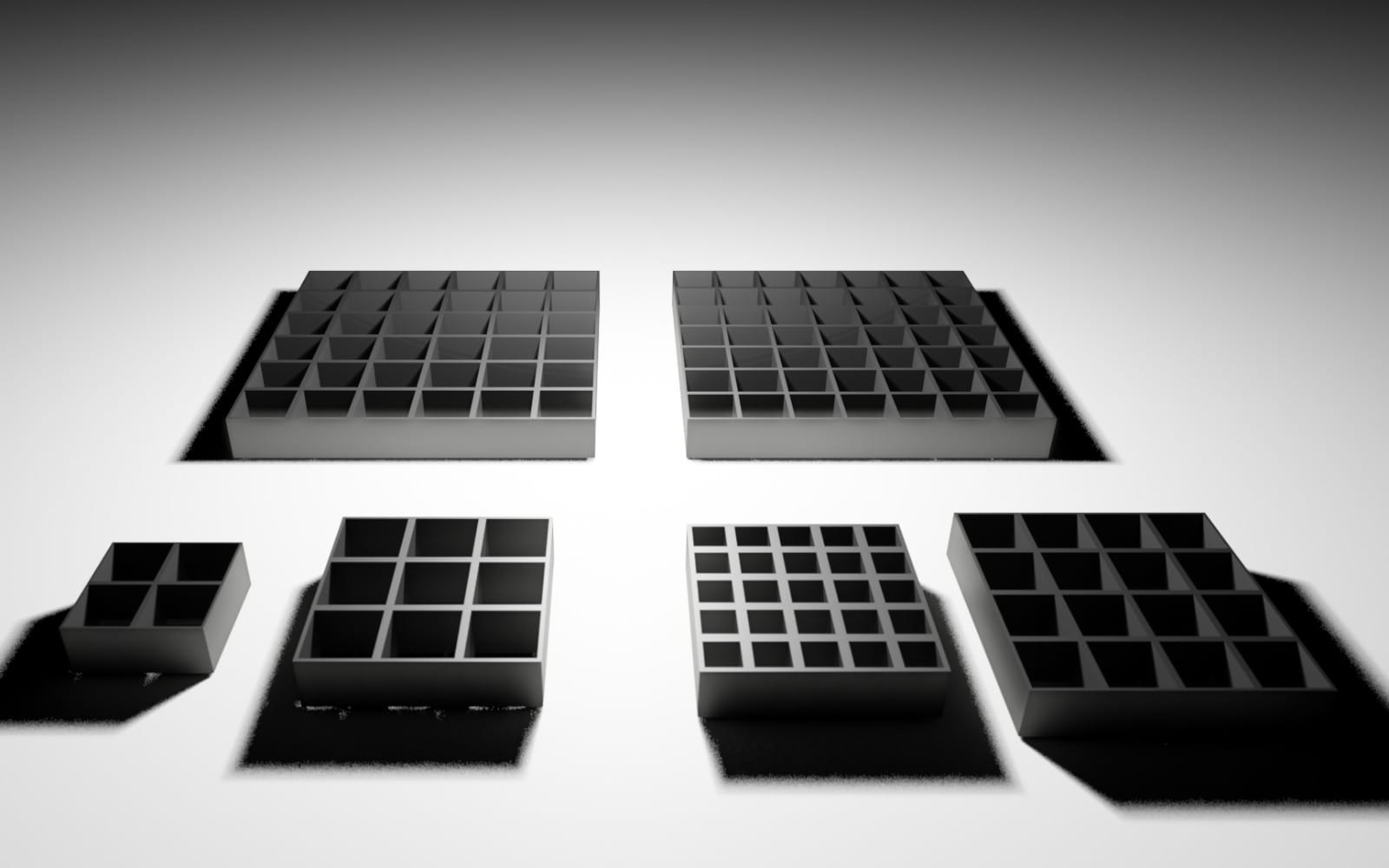Low poly 3D plug tray models shown from multiple angles with grid compartments in black and gray