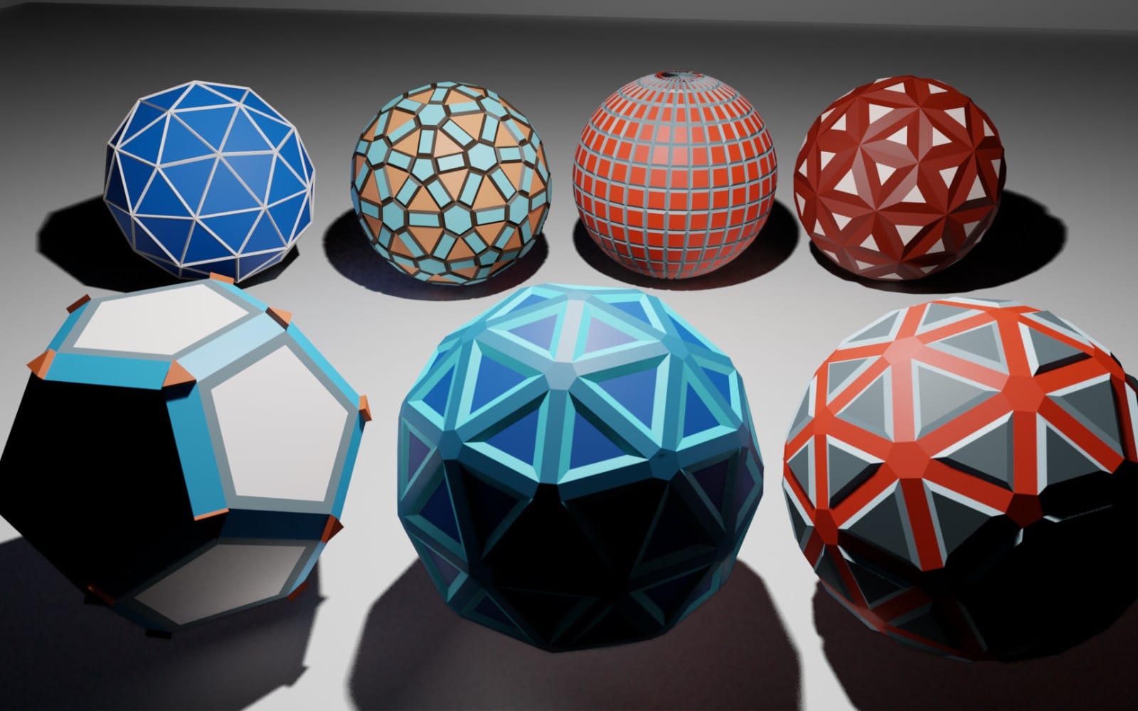 Set of colorful geometric sphere 3D models with faceted panels on a gray background