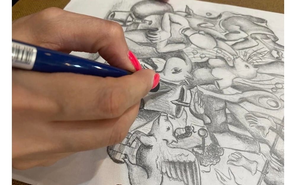 Hands drawing surreal pencil art on paper, AM Surreal Souls 4-sheet collector pack digital art bundle 300 DPI