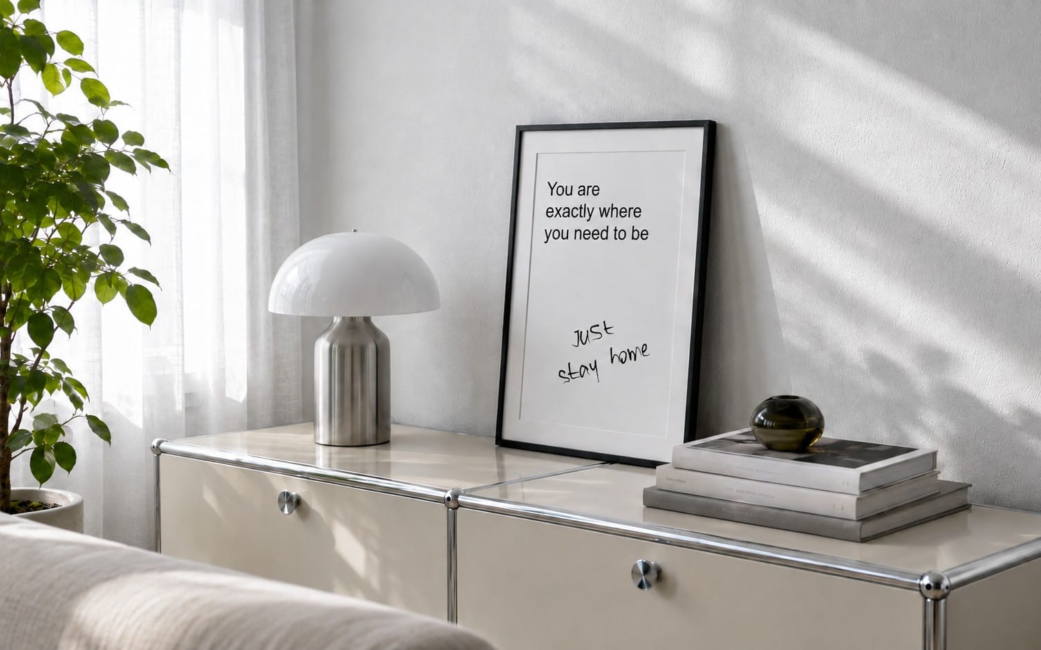 Sarcastic wall art poster in a black frame reading You are exactly where you need to be with just stay home