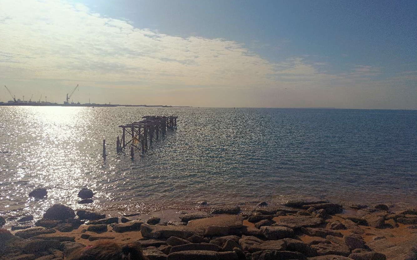 Broken Bridge at Sunset by the Sea